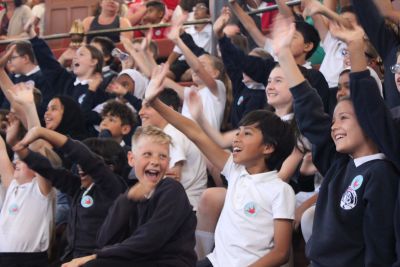 Pupils singing at multilingual concert