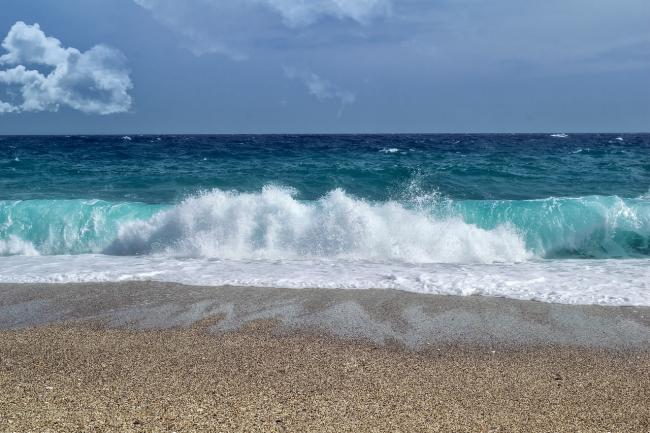 Waves crashing against the beach