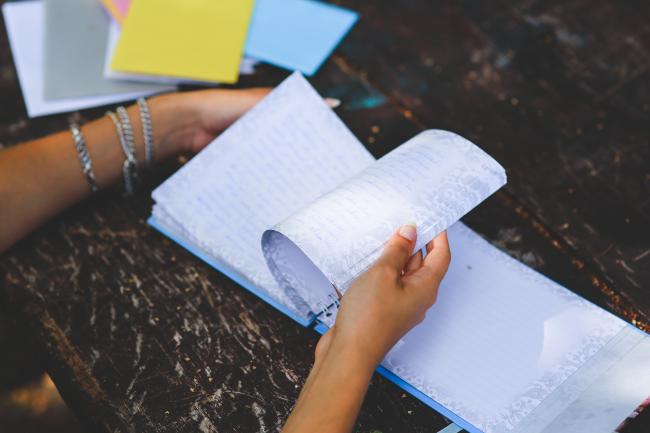 pupil with notebook